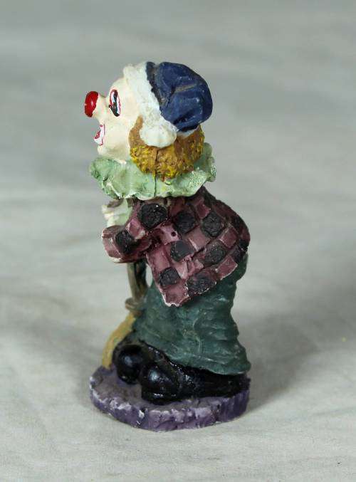 MOLDED CLOWN ON A STAND HOLDING A BROOM - BID NOW!!