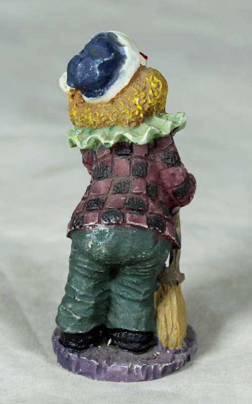 MOLDED CLOWN ON A STAND HOLDING A BROOM - BID NOW!!