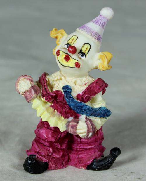 MOLDED CLOWN PLAYING A CONCERTINA - BID NOW!!