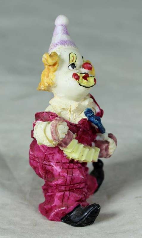 MOLDED CLOWN PLAYING A CONCERTINA - BID NOW!!