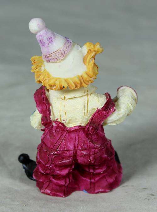 MOLDED CLOWN PLAYING A CONCERTINA - BID NOW!!