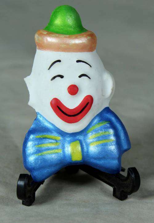 MOLDED CLOWN FACE WITH A BLUE BOW TIE- BID NOW!!