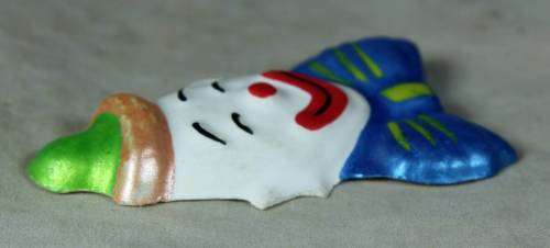 MOLDED CLOWN FACE WITH A BLUE BOW TIE- BID NOW!!