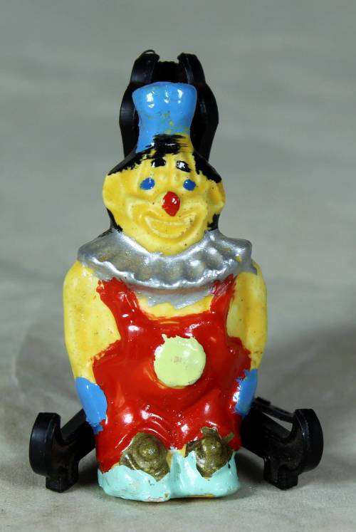 MOLDED CLOWN IN A RED DUNGREE AND A BLUE HAT - BID NOW!!