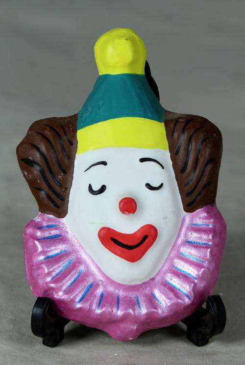 MOLDED CLOWN FACE WITH A PINK COLLAR - BID NOW!!