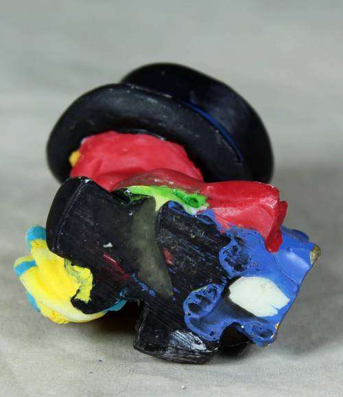 MOLDED CLOWN IN A  BLACK HAT & UMBRELLA WITH A SUITCASE