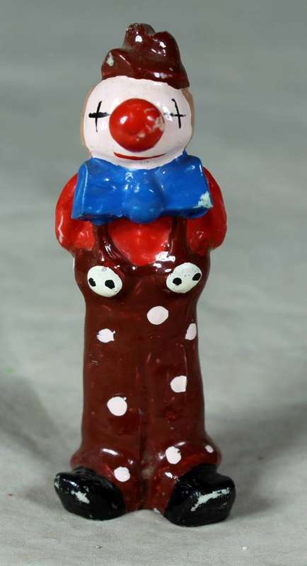 Molded clown with a blue bow tie
