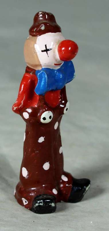 Molded clown with a blue bow tie