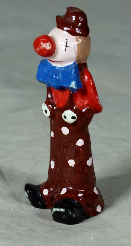 Molded clown with a blue bow tie