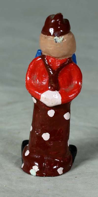 Molded clown with a blue bow tie