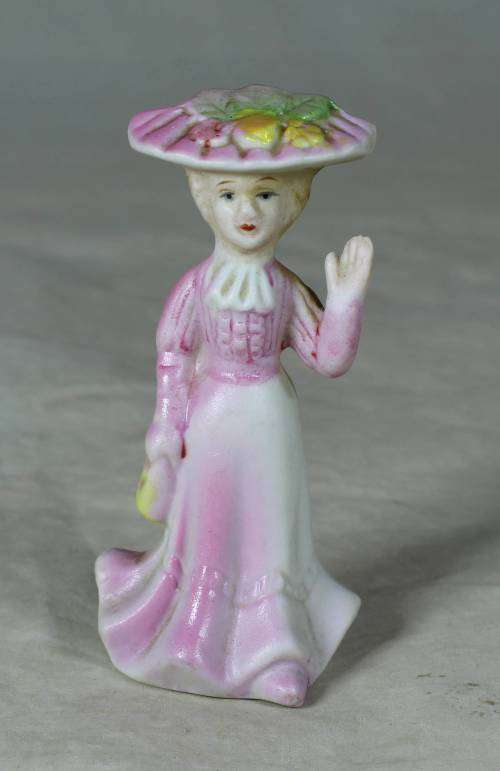 Ceramic Victorian lady waving