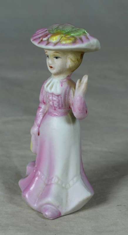 Ceramic Victorian lady waving