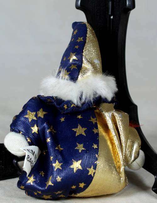 Porcelain and cloth clown dressed in blue and gold