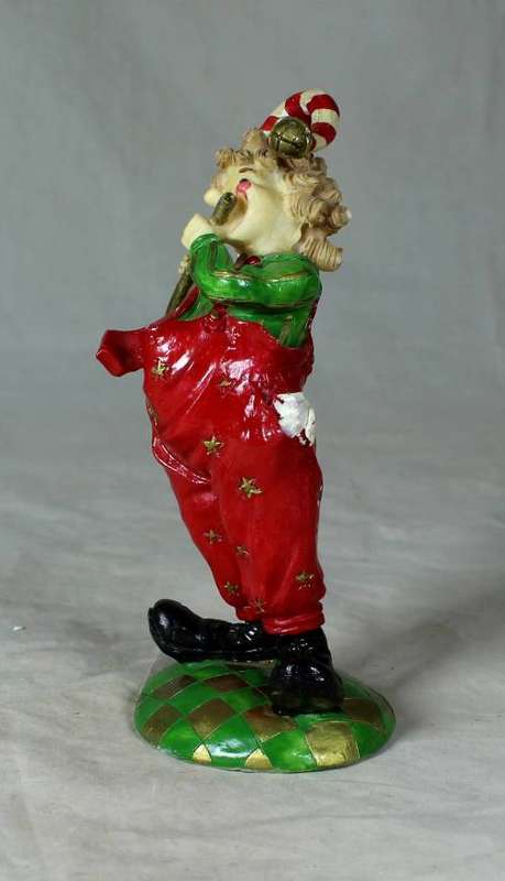 MOLDED CLOWN PLAYING THE FLUTE - BID NOW!!