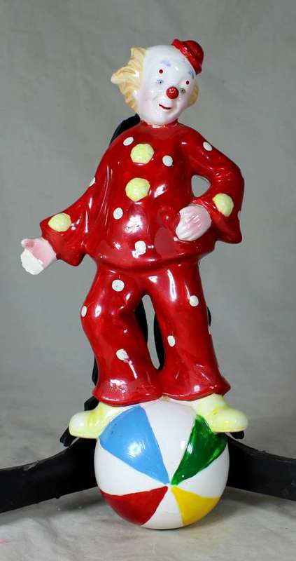 PORCERLAIN CLOWN ON A BALL