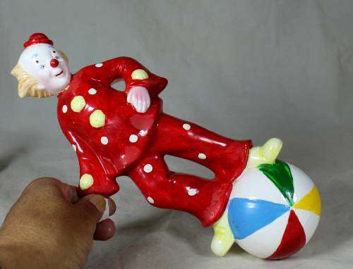 PORCERLAIN CLOWN ON A BALL