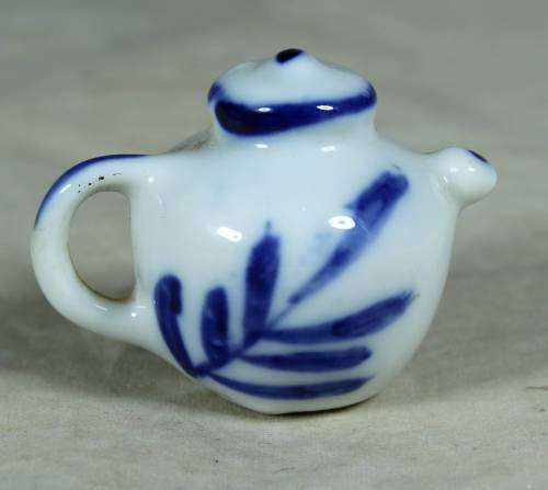 Miniature porcelain blue and white tea pot