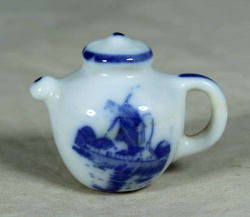 Miniature porcelain blue and white tea pot
