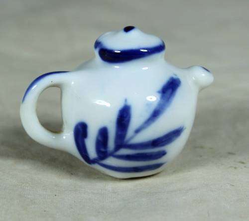 Miniature porcelain blue and white tea pot