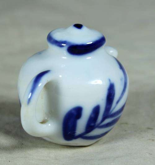 Miniature porcelain blue and white tea pot