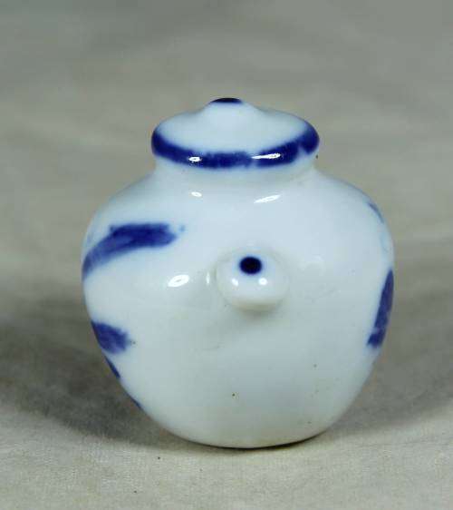 Miniature porcelain blue and white tea pot