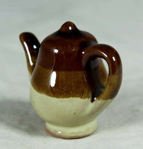 Miniature porcelain brown and light brown kettle