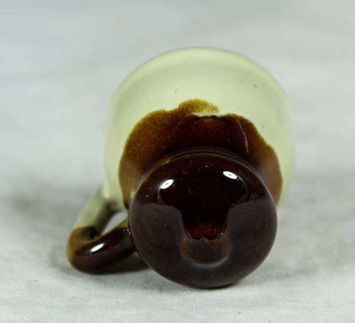 Miniature porcelain brown & beige milk jug