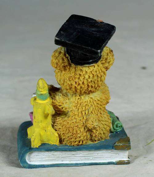 Molded bear graduating