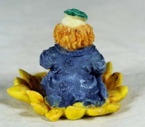 CERAMIC CLOWN SITTING IN A SUNFLOWER  (COOL) -BID NOW !!!