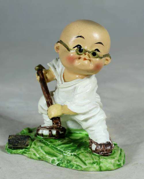 Kung Fu Buddha with a fighting stick