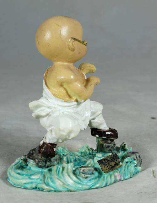 Kung Fu Buddha with eagle claw stand
