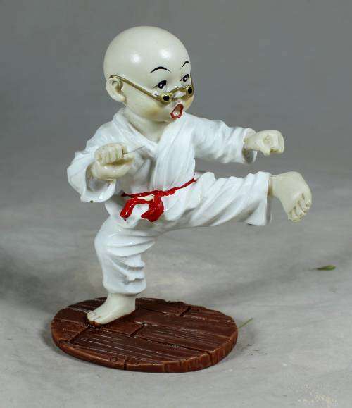 Kung Fu Buddha standing in a kicking position