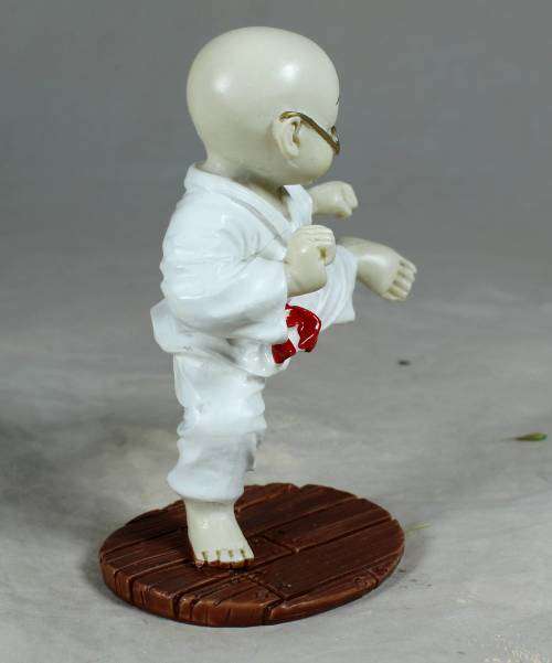 Kung Fu Buddha standing in a kicking position