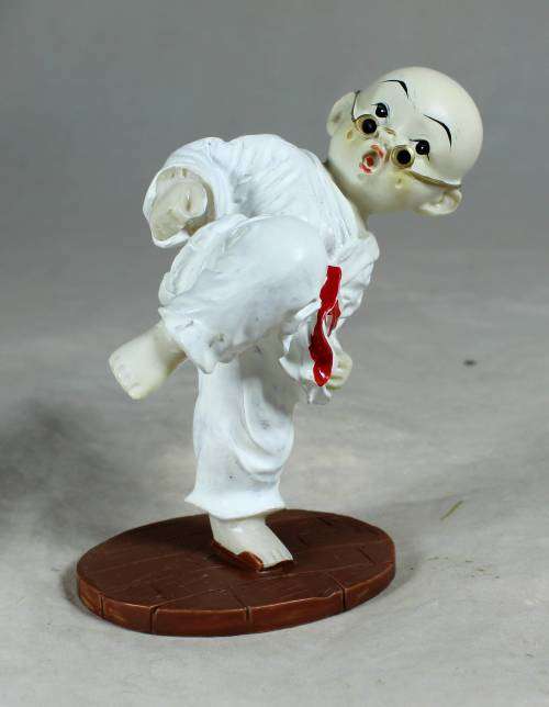 Kung Fu Buddha in a kicking position