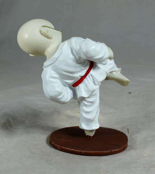 Kung Fu Buddha in a kicking position