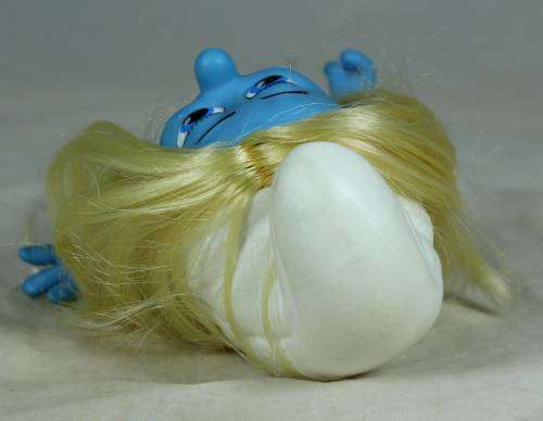 Smurfette dressed in a summer dress