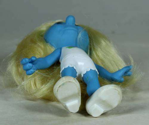 Smurfette dressed in a summer dress