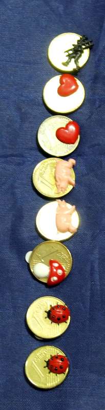 Group of eight stick on one cent coins with hearts, ladybugs and pigs