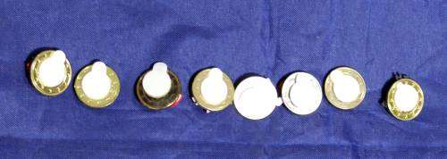 Group of eight stick on one cent coins with hearts, ladybugs and pigs