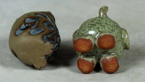 Miniature stone owl and piglet