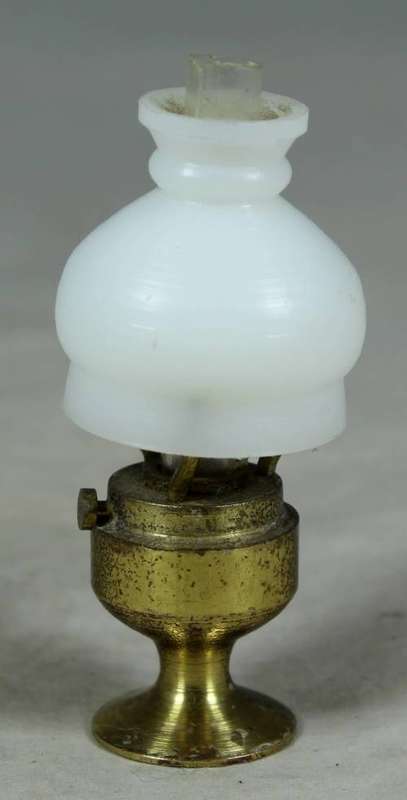Miniature handcrafted brass temptation lamp
