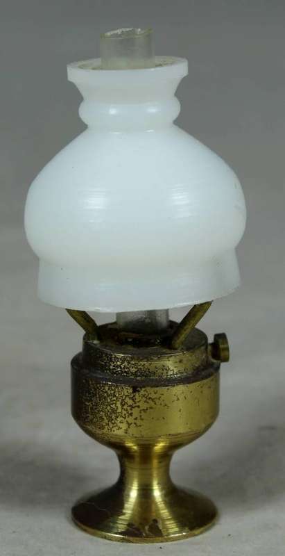 Miniature handcrafted brass temptation lamp