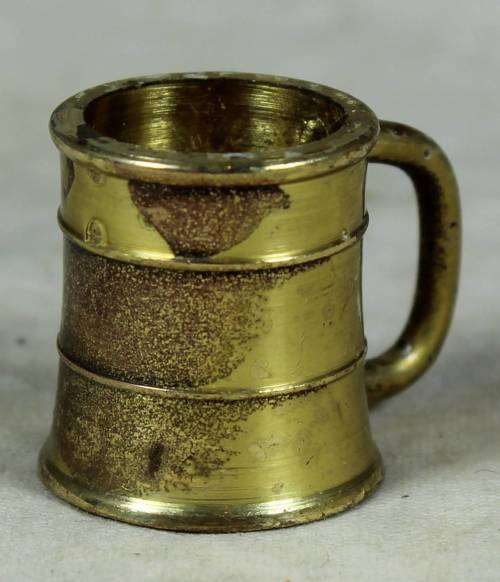 Miniature handcrafted brass temptations mug