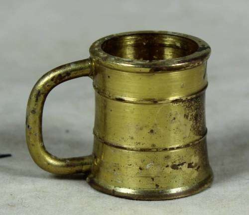 Miniature handcrafted brass temptations mug