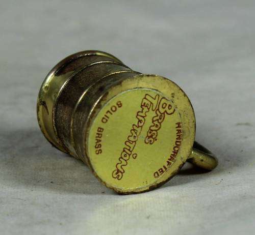 Miniature handcrafted brass temptations mug