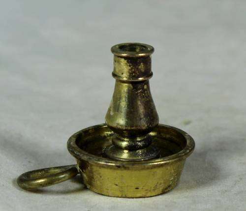 Miniature handcrafted brass temptations candle holder