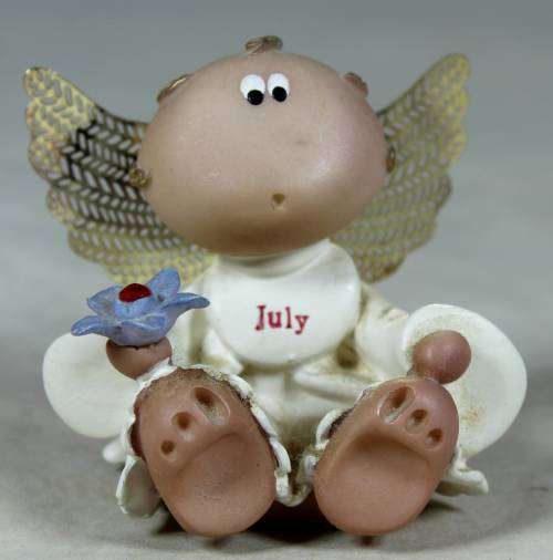 MOLDED JULY ANGEL ( BEAUTIFUL)-BID NOW!!