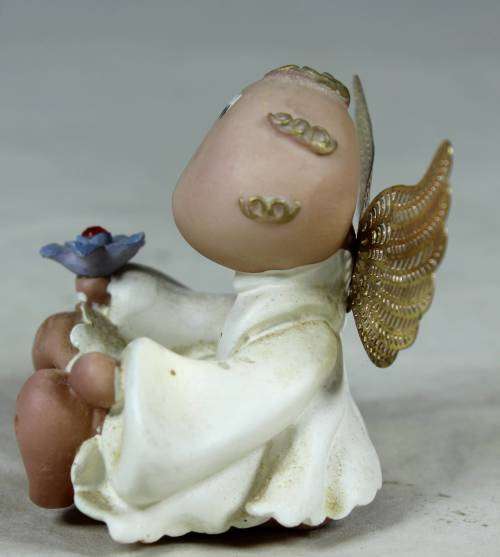 MOLDED JULY ANGEL ( BEAUTIFUL)-BID NOW!!