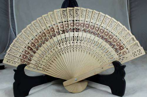 Perforated wooden fan