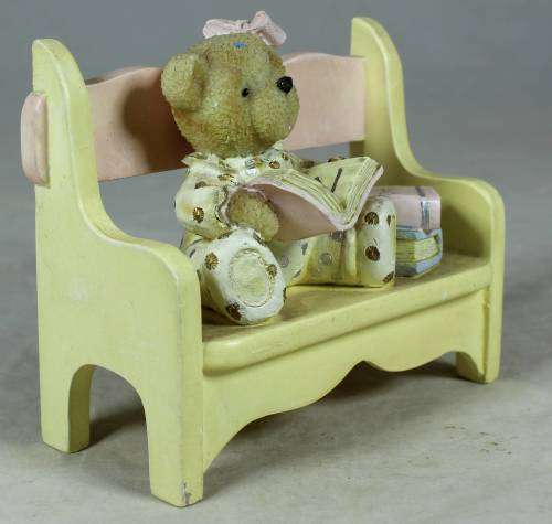 VERY INTELLIGENT LITTLE BEAR READING ON A BENCH-BID NOW!!